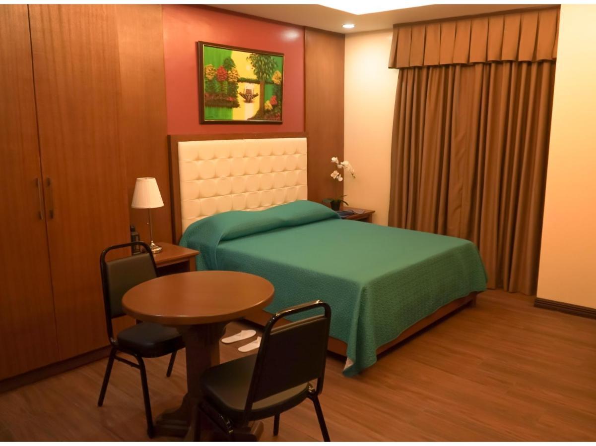 M28 Hotel And Apartments Кесон-Сити Экстерьер фото